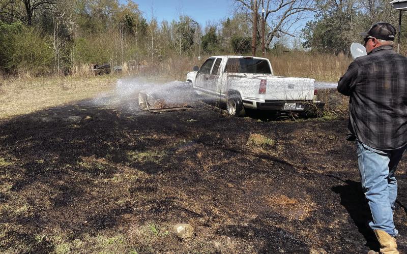 The Joaquin Volunteer Fire Department responded to a grass fire call.The homeowner had the fire under control when the JVFD arrived, but the yard was sprayed with a brush truck to prevent any flare ups. (Submitted photo)