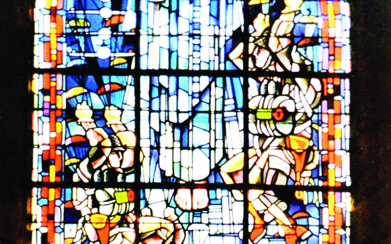 A stained glass window in the St. Mere Eglise church commemorating the paratroopers who landed in the town during the Normandy invasion Davis family