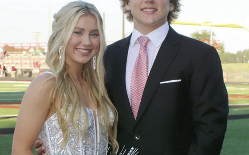 Homecoming Queen - Taylor Jones escorted by her brother, Dallas Jones.