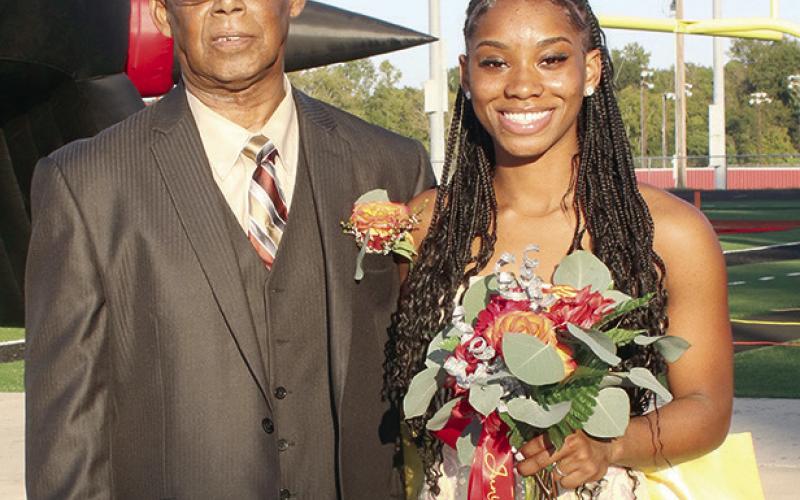 Junior Duchess - Kenadee Lathan escorted by Gilbert Curtis.