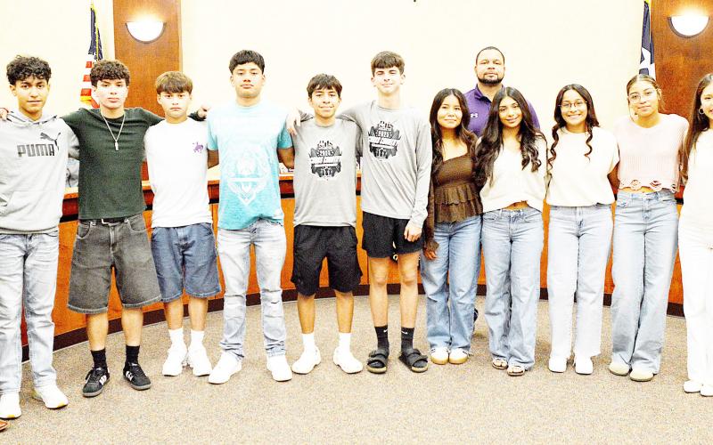 The Center High School Varsity Cross Country Team was recognized at the Center ISD Board of Trustees meeting on Wednesday, November 12. The team is coached by Kevin Smith. During the meeting, Cash Ruiz led the prayer, Cynthia Suaste led the Pledge of Allegiance, and Oswaldo Reyes led the Texas Pledge. The recognition celebrated the team’s hard work and sportsmanship both on and off the course. David Danley | Light and Champion