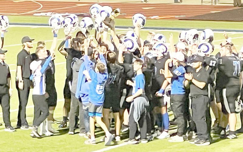 Joaquin Rams players celebrate on the field after their 42-21 win over Centerville last Friday night. Ashley Balkcom | JHS