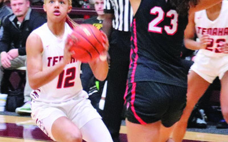 Kayanna Cox leaves one defender on the floor as she prepares for a jump shot in Tenaha’s regular season action earlier this year. (File photo by Colton Bragg)