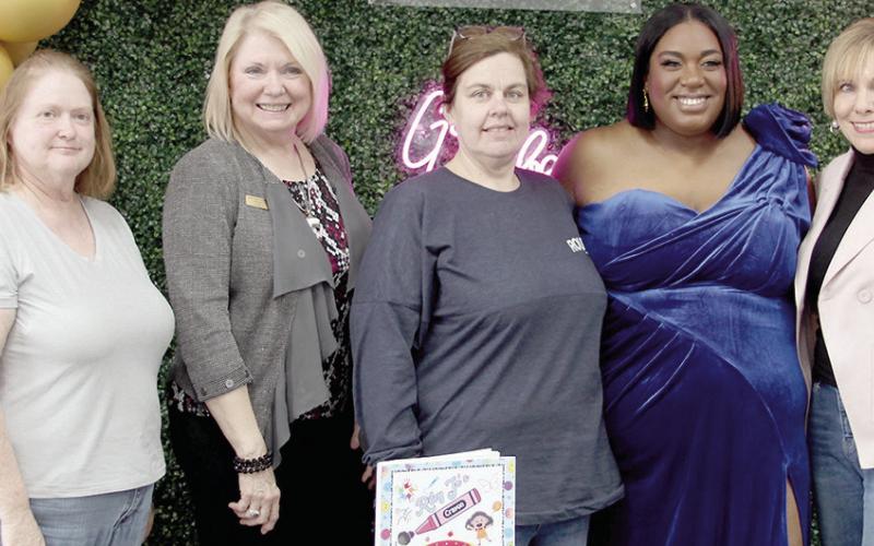 Chamber Ambassadors and friends gathered for Riley Jo Barnes Coloring Book Signing at Riley Jo’s Sip, Cake &amp;amp; Paint at 1135 Hurst Street Friday, March 1. Barnes opened “Riley Jo’s” in September of 2023 offering a studio where the community can come together to paint and make memories. She has published her first coloring book with more in the works.
