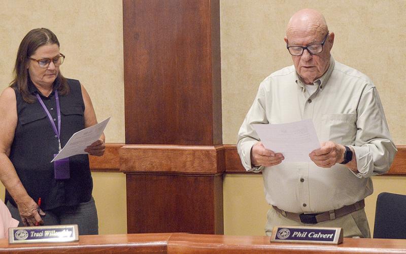 Phil Calvert being sworn in as a new member of the Center ISD Board of Directors. Calvert will be filling out the term of Daphne LaRock, who recently resigned from the board. New elections for the board will be held in November. David Danley | Light and Champion