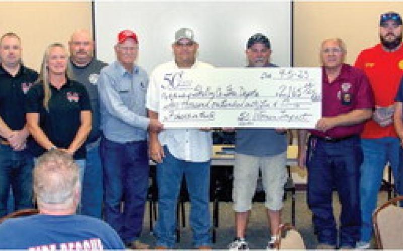 Those making donations included 50 Women of Impact. 50 Women Impact members (left to right) included Laura Rowe, Montie Jones, Michelle Richards,Andi Foster, Sandie Mason, Merle Howard, (firefighters) Bob Vandrovec, Jonathan Filz, Chris Koltonski, Jeremiah Huss,July Stewart,John Green,Jerryl Adams,Jeremy Boyette,Mike Stephens,Mark Odom,Chad McCormick,Waylon Griffith, (50 Women Impact members), Linda Miller, Meg Camp,Alease Copelin, Sheila Harris, and Lisa McAdams.