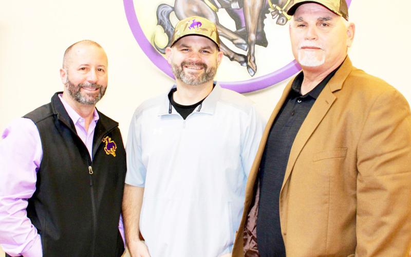 Center ISD Superintendent Jake Henson (left) welcomes Jack Alvaraez (right) to the district as its new Athletic Director/Head Football Coach. Also joining the CHS athletic staff will be Brandon Alvarez as Asst. Athletic Director. Submitted | Light and Champion