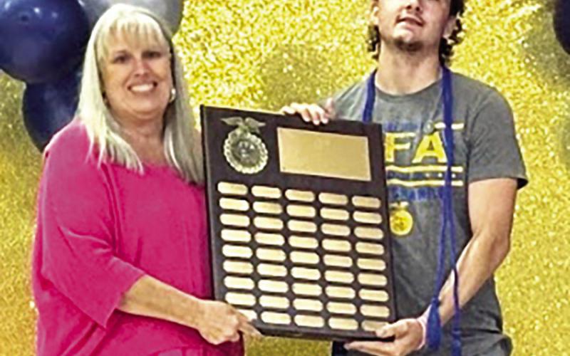 Gilbert Link Memorial Scholarship Recipient Lo - gan Smith presented by Shana Brittain