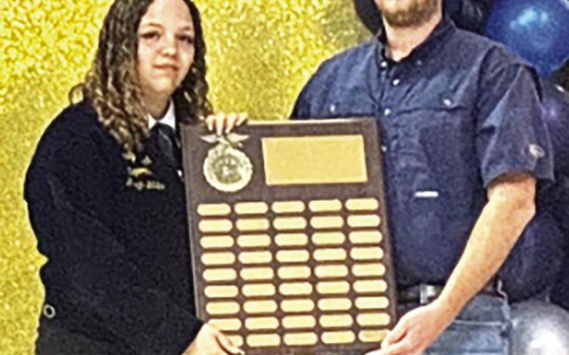 Lucas Family Farms Scholarship Recipient Emily Leach , presented by Kamden Lucas