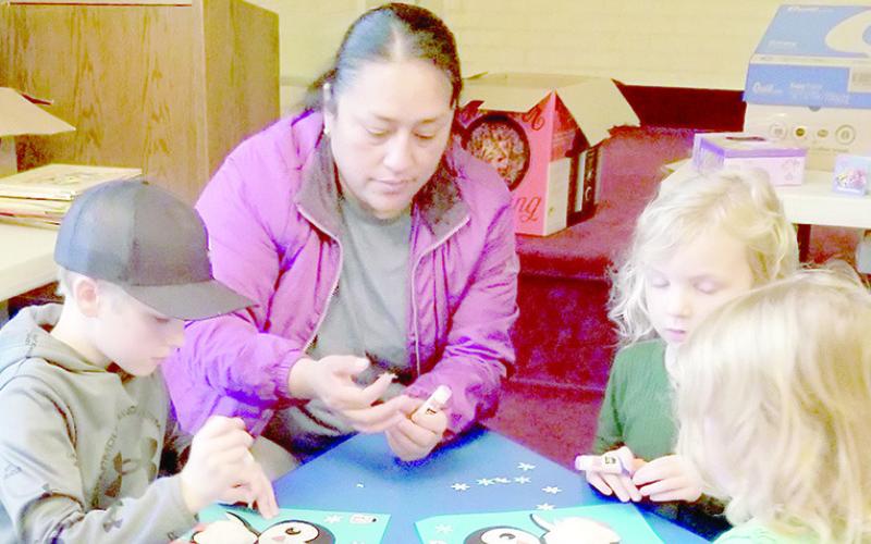 Arts and crafts are just one of the many fun things for kids (and adults) to do at the Fannie Booth Brown Library in Center. Come in and get a free library card today. Submitted Photo | The Light and Champion