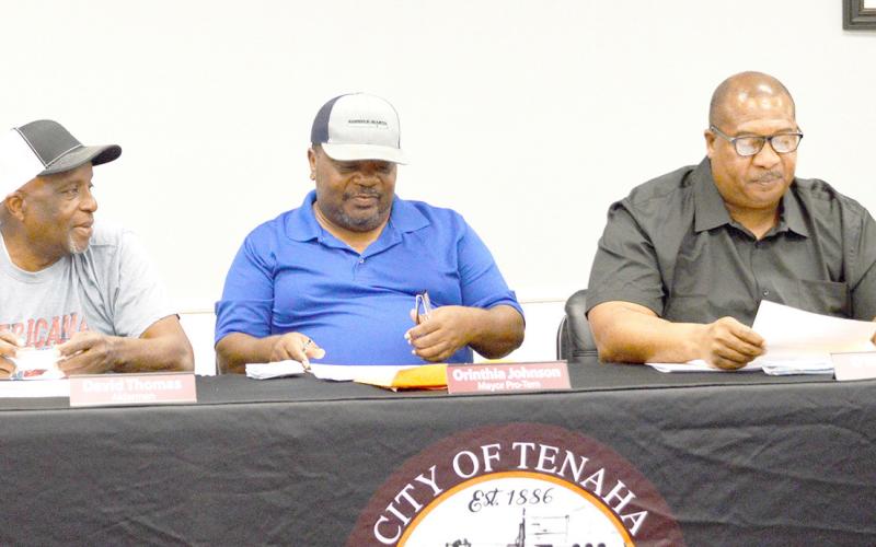David Thomas (from left), Orinthia Johnson and Mayor O’Neal Jones discuss the 2025-26 proposed tax rate at the Tenaha City Council’s September meeting. David Danley | Light and Champion