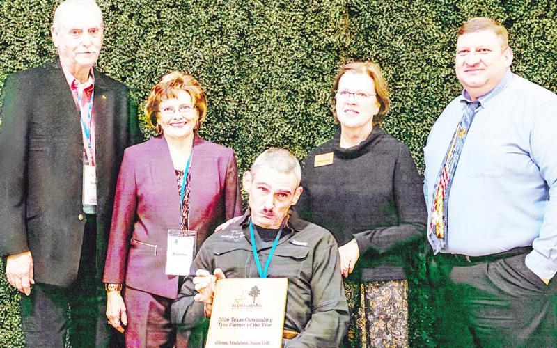 Glenn, Madeline, and Jason Gill (center), recipients of the 2025 Outstanding Tree Farm of the Year Award, are joined by Susan Stutts (right), TFA Senior Director, and Michael Easley (far right), Chair of the Texas Tree Farm Committee, during the Texas Forestry Association’s annual meeting in Nacogdoches. Submitted | Light and Champion