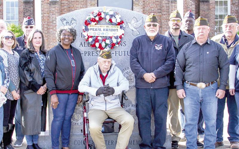 Members of VFW Post 8904, Auxiliary and friends gathered Thursday Dec. 7 at the Veteran’s Memorial on the 185 Shelby County Historic Courthouse grounds to remember the Japanese attack on Pearl Harbor Sunday, December 7, 1941. Leon Aldridge| The Light and Champion