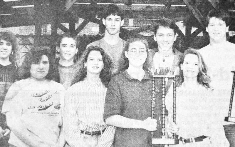 Members of the Tenaha Tiger and Lady Tiger golf teams headed to region are (front, left) Deanne Swint, Michelle Looney, Susie Crawford and Janelle Looney; (back, left) Amy Agnew, Chad Christian, Chad Sherrod, Joey Latham and Bronson Holmes. The girls took the district championship, while the boys placed second. Tenaha will play at region April 26 &amp;amp;27 in Longview. (Staff photo by Tracy Broadway)