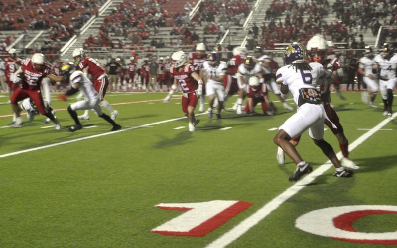 Roughrider defense in the second quarter fighting for edge containment against this Carthage running attack that pounded the rock hard. Dennis Phillips | Light and Champion