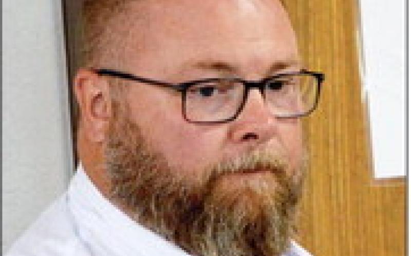 Eric Lawrence of the Shelby County Appraisal District discusses with the court the paying of a property tax refund to Tyson Foods. Zack Clark | Light and Champion