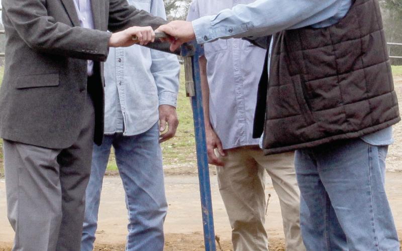 President Eric L. Garrett (left) and (left to right) Shelby County Commissioners Tom Bellmyer, Roscoe McSwain, and Stevie Lout dedicated the new Paxton Water Supply well Friday, Feb. 16, and “officially” turned on the water. Leon Aldridge|The Light and Champion