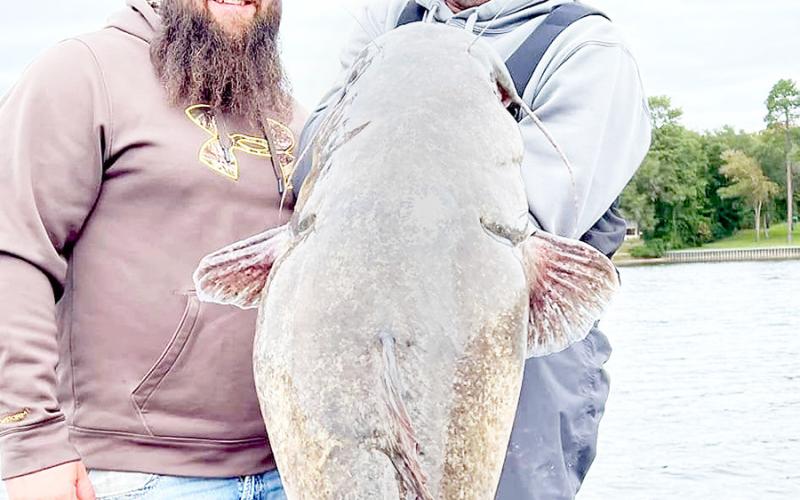 William Oliver of Chandler (right) specializes in putting clients on whopper flathead catfish using a rod and reel. Oliver launched a unique recapture rate tagging study in 2022 that has since yielded some interesting results. He currently has nearly 850 flatheads ranging 12-75 pounds in lakes Tyler and Palestine. Photo Courtesy of William Oliver