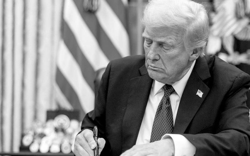 President Donald Trump inside the Oval Office on January 20, 2025 completes the necessary signature to unleash 200 Executive Orders to “reshape America into greatness.” Photo courtesy of Wikipedia