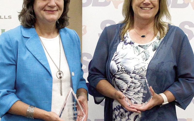 Named the Elementary Teacher of the Year was Kathy Davis (right) at F.L. Primary School in Center. The Secondary Teacher of the Year is Mihaela Munday at Timpson High School (left). Leon Aldridge | The Light and Champion