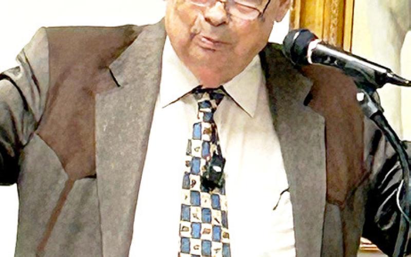 Bill O’Neal, author and former Texas State Historian, reviews his newest book for the Timpson Area Genealogical and Historical Society at its Aug. 20 meeting. Submitted | Light and Champion