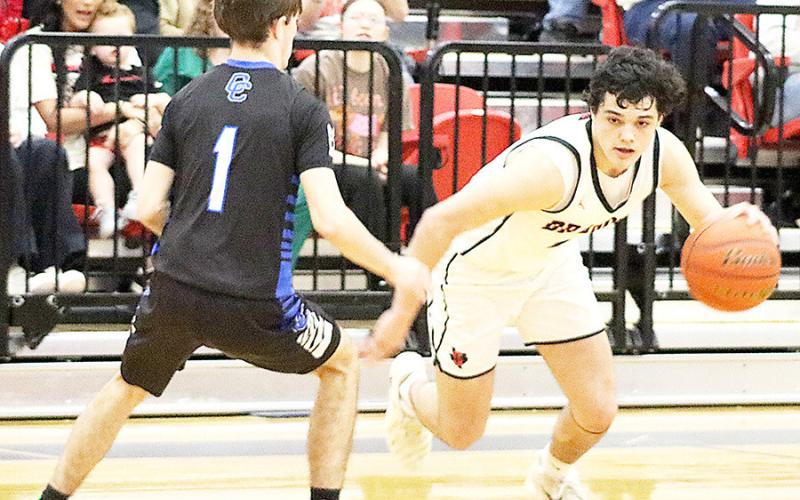 After being ranked third in their district the Shelbyville Dragons boys basketball team fell to the Elysian Fields Yellowjackets 84-56 in the first round of the playoffs. Dragon Yearbook | Light and Champion