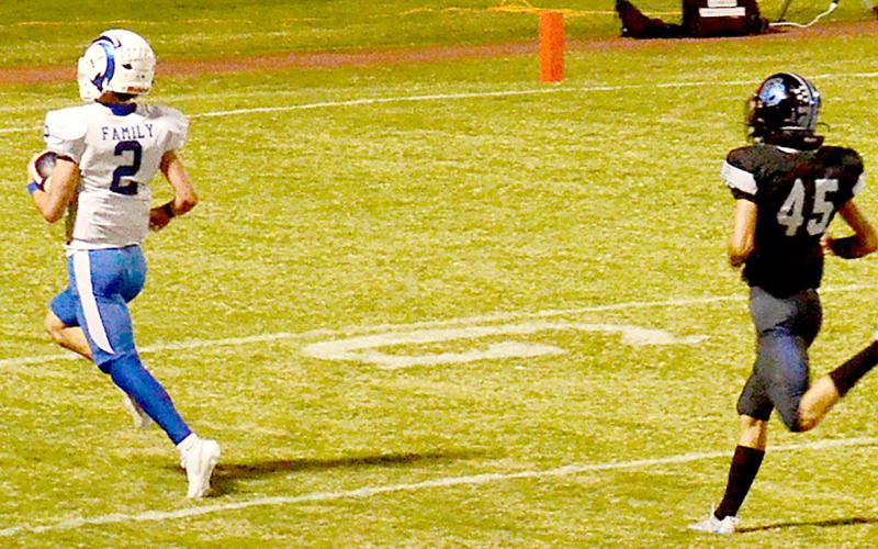 Cooper Bragg strides for the end zone with a Corrigan-Camden defender in vain pursuit. Kelsi Wood | JHS
