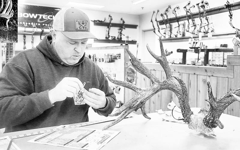 Boone and Crockett Club official scorer Kyle Easley of McKinney taped the Sewell buck in mid-January following the mandatory 60-day drying period to allow the bone to fully dry. The rack nets 227 and will be entered in the B&amp;amp;C all-time record book, pending approval. Photo Courtesy Courtland Sewell