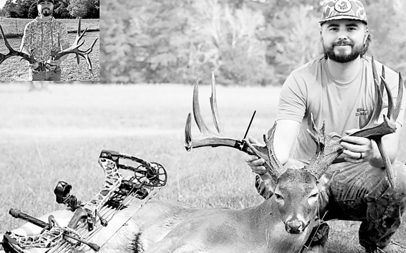 Brody Chapin of Elkhart with the super wide 19-pointer he arrowed on five acres in Anderson County. It was his first encounter with the 207 4/8-inch whitetail. The buck had an inside spread of 25 1/8 inches. Photo courtesy of Brody Chapin