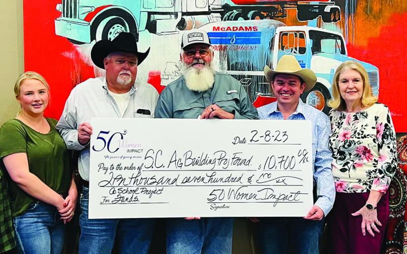 50 Women Impact donates to Ag Building Project Fund