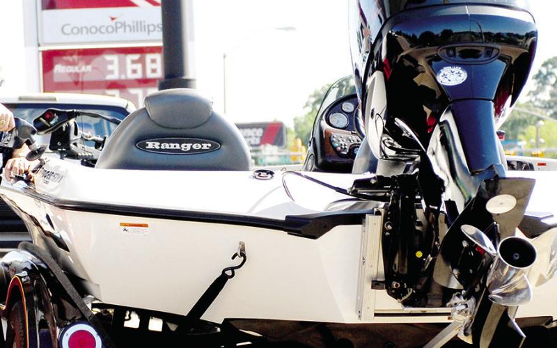 Dragging a boat behind a tow vehicle can reduce fuel economy as much as 30 percent, possibly more. Anglers can increase fuel economy by mak- ing sure the tires on a trailer are int ated properly and that the tow package is in balance with the vehicle.