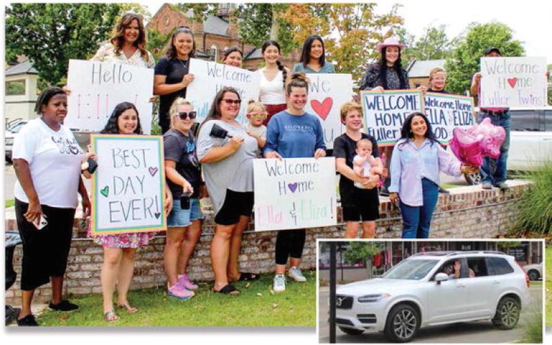 Fuller twins welcomed home