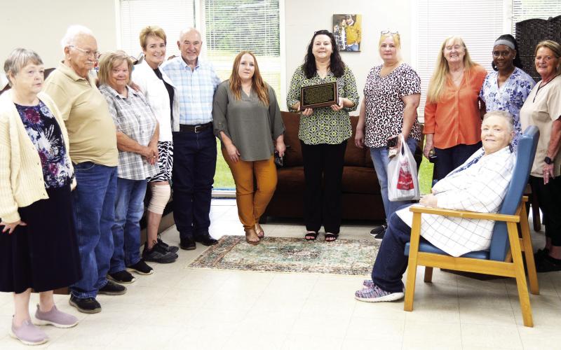 SCOM holds raffle drawing, dedicates library
