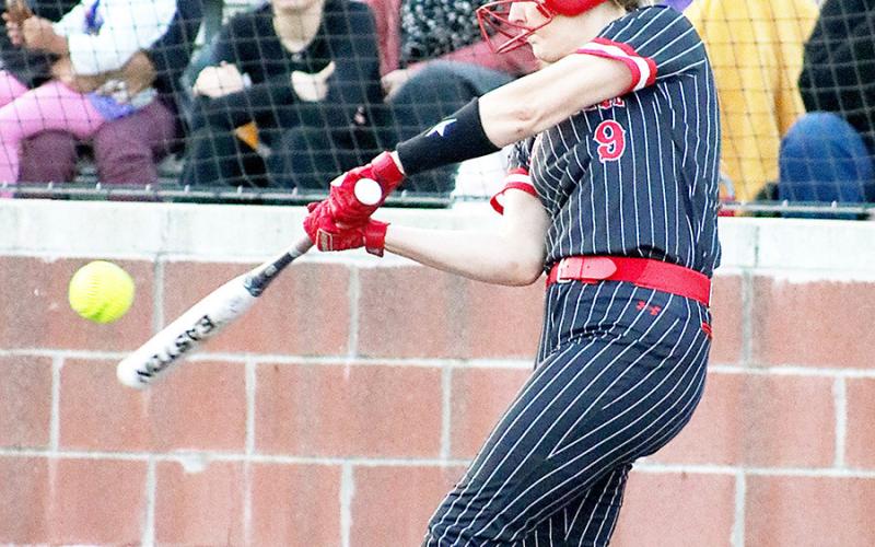 The Shelbyville High School Lady Dragons softball team in action against the Center Lady Riders earlier this season. The Lady Dragons prevailed 8-7. The Dragon Yearbook | The Light and Champion