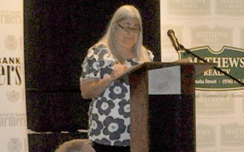 Rose Spectter, recipient of the 2022 Distinguesed Award, presented the 2023 award to J.J. Ford in a heartfelt speech. Photo By Dennis Phillips
