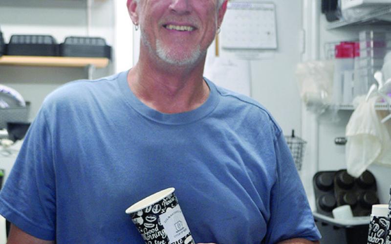 Marty at Diamond B keeps the coffee and treats flowing in Center, even if he stops for a photo now and again. Photo by Veronica Davis