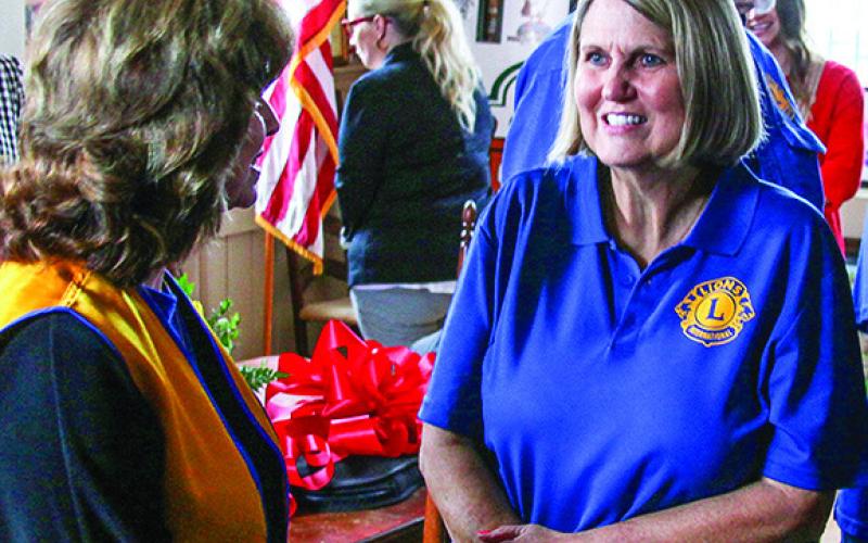 Shelbyville Lions Club members, chamber Ambassadors and friends visit at the Shelby County Chamber of Commerce Office prior to the New Member Ribbon Cutting Friday, Jan. 26. Photo by Leon Aldridge