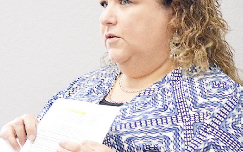 Tax Assessor-Collector Debora Riley discusses the proposed 2025 property tax rate with the Shelby County commissioners court at its Aug. 27 meeting. Zack Clark | Light and Champion