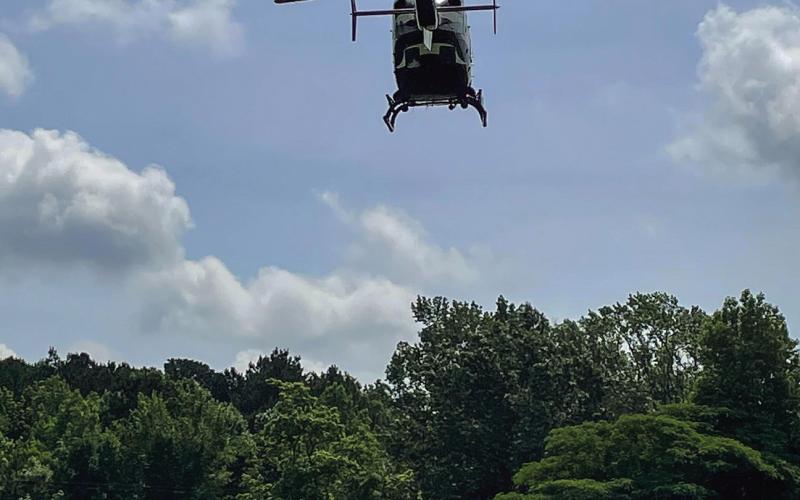A Friday morning motor-vehicle accident involving two tractor trailers on Highway 84 East of Joaquin sent one driver to the emergency room via helicopter. The JVFD aided by setting up a temporary landing zone at the baseball field. (Submitted photo)