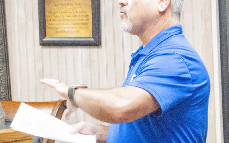 Billy Carrington, elementary principal, updates the Joaquin ISD board of directors on changes to the student handbook. Zack Clark | Light and Champion