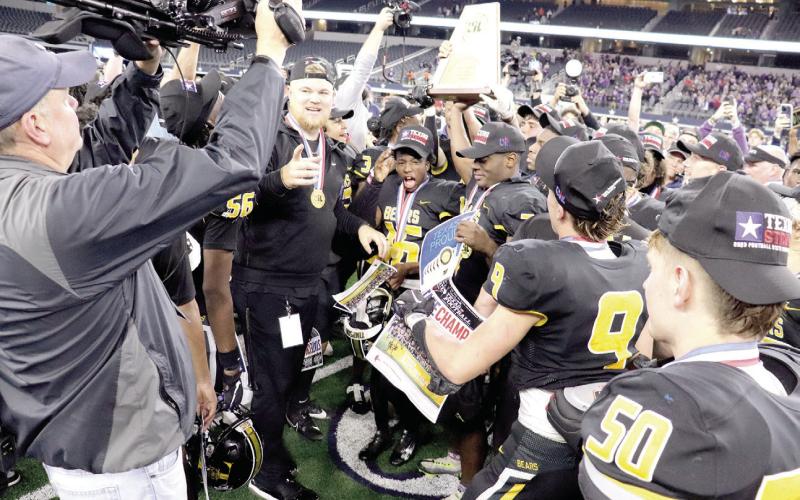 The moment every Timpson coach, player, fan and friend of had been waiting for, the arrival of the 2023 UIL 2A Div. 1 State Trophy. Talor Bragg | The Light and Champion