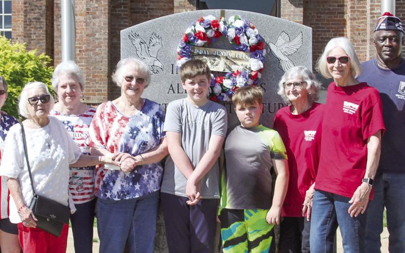 Shelby County VFW Post 8904 gathered June 6, 2024, at the Veterans Memorial on the lawn of the Historic Courthouse to observe the 80th anniversary of D-Day. Leon Aldridge | Light and Champion