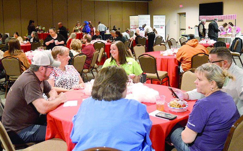 A Taste of the Holidays experienced a large turnout as local residents gathered at the Windham Civic Center to sample food and drink offerings from many local restaurants and caterers in a preliminary celebration of the holiday season. David Danley | Light and Champion