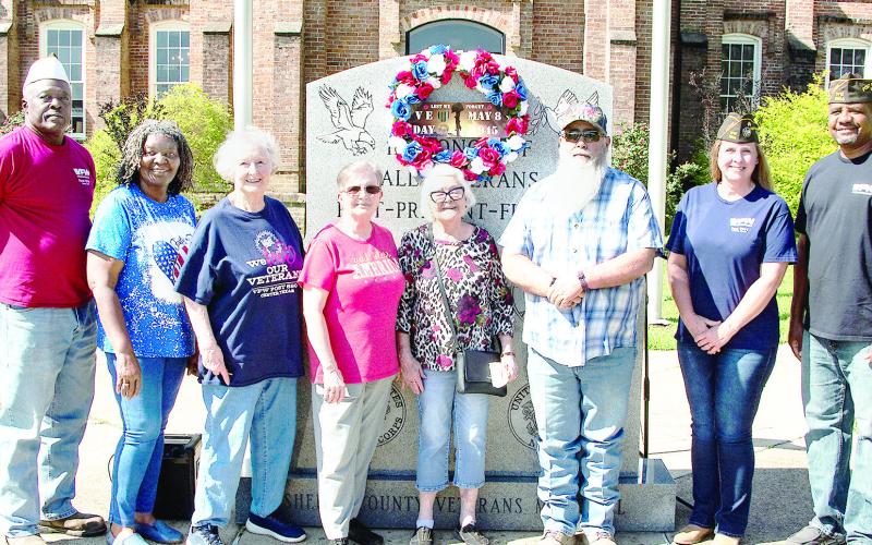 The Center VFW Post 8904 held its 2025 Victory in Europe program on May 8 in rememberance of the Allied victory over Germany at the end of WWII in 1945. Program attendees were(l-r): Post Chaplain Richard Lundie, Auxiliary member Linda Lundie, Auxiliary President Mary Fausett, Auxiliary Treasurer Theresa Hume, citizen Terry Polly, Post life member Sean Martin, Post Quartermaster Mary Roberts, Post Commander Derrick Roberts and Post Adjutant Larry Hume (not pictured). Contributed | Light and Champion