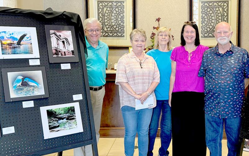 Winners in the Farmers State Bank photo contest were announced, and awards presented Monday, July 1. Presentations were made in the bank’s main lobby Pictured left to right are contest judge Leon Aldridge, winners: Billie F. Jones, B.J. Wood, Julie Cantrell-Green, and Danny Pickens. not pictured are winners LeeAnn Robertson and Janice Carter. Stephanie Elswick | The Light and Champion