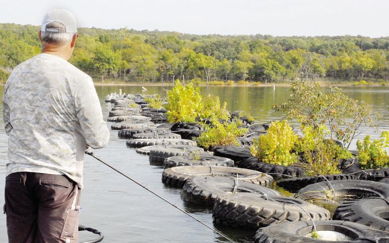 Man-made breakwaters like this row of tires can be magnets for bass because of the cover and shade they provide. Photo by Matt Williams
