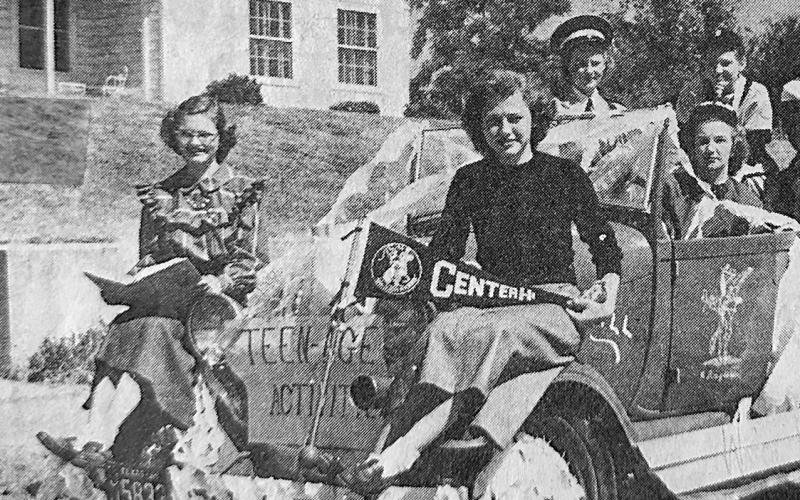 1949 FAIR PARADE — Elaine Weaver was the driver of this entry in the 1949 Shelby County Fair Parade held annually at Center for several decades. Others in the car who have been identified are Janette Searcy and Betty Parker. Do you know who the others are? (Editor’s note: Mattie asked about identifying others in the car in the original 1983 photo cutline. We ask the same question today. Do you recognize anyone else in this photo?)