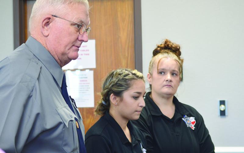 Sheriff Gerald Corbell, Compliance Officer Araceli Garcia (center), and Jail Administrator Tiffany Ryals (right) requested that the commissioners’ court hire a full time nurse for the Shelby County jail at its special meeting last week. Zack Clark | Light and Champion