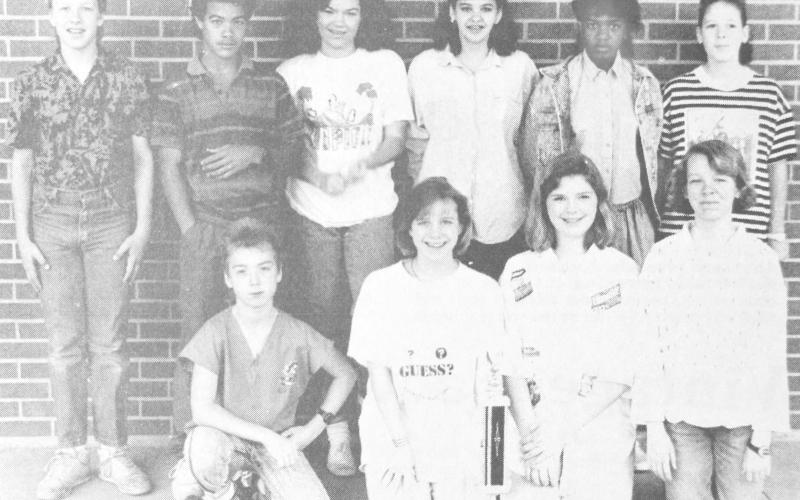 SEVENTH GRADE UIL WINNERS – Center Junior High School students who placed in the recent University Interscholastic League competition at Huntington were (front, from left) Chris Coleman, Amanda Holt, Judy Hawkins and Mary Moore. Also, (standing, from left) Bryan Hanson, Vic Carter, Christi Adams, Shannon Thomas, Angie Jackson and Nancy Wyatt.