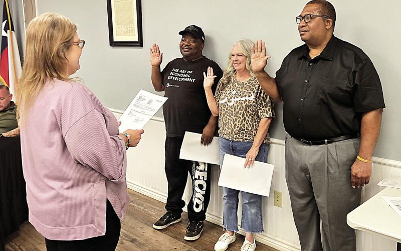 Winners of the recent Tenaha city council elections were sworn in by City Secretary Amanda Treat-Brock at a special meeting of the council held May 12. Being sworn in were incumbent member Orinthia Johnson, new member Cristi Estes and incumbent mayor OMNeal Jones. Submitted | Light and Champion